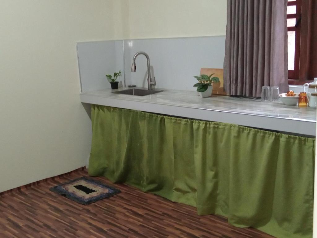 Η κουζίνα ή μικρή κουζίνα στο Yemi Bungalow Ella