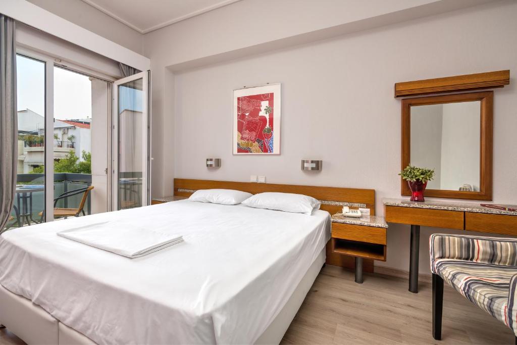 Llit o llits en una habitació de Park Hotel