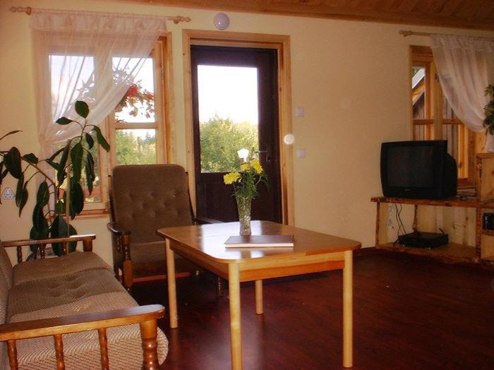TV a/nebo společenská místnost v ubytování Udumäe Holiday Farm