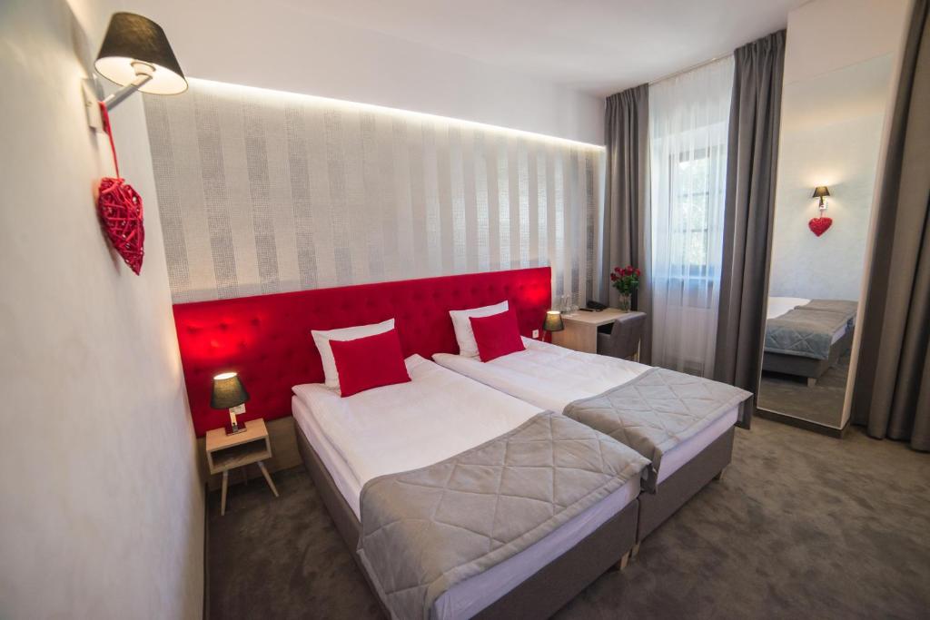 Postel nebo postele na pokoji v ubytování Hotel Arte