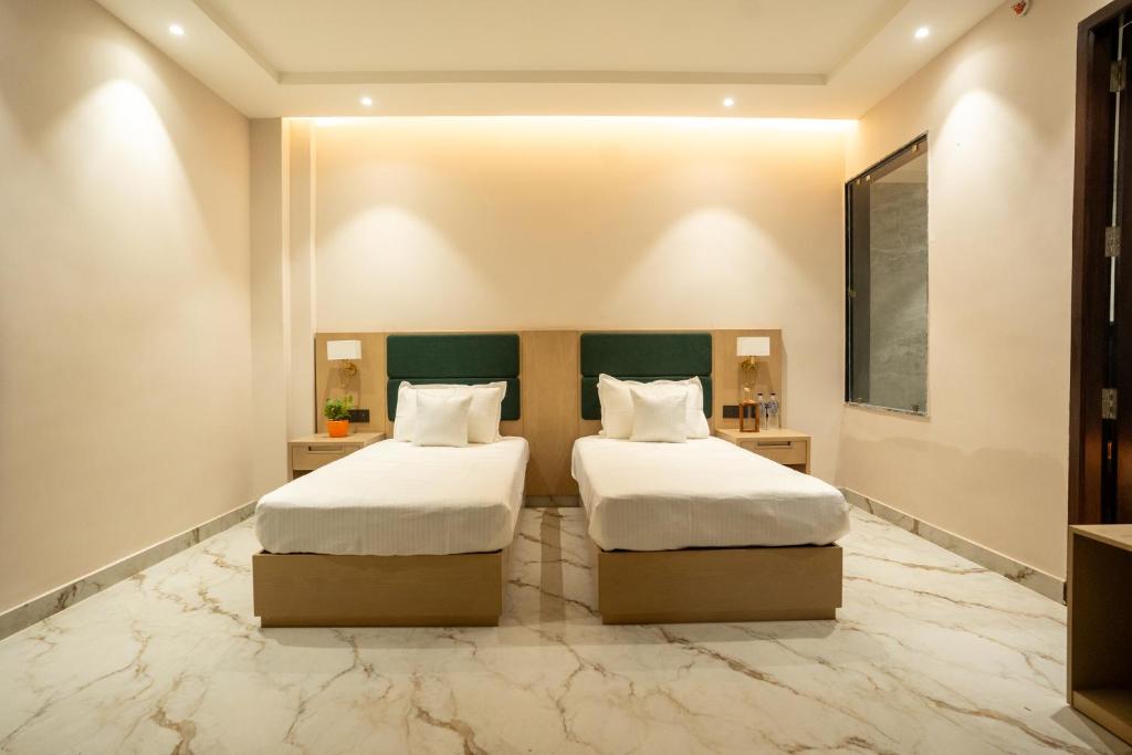 Ένα ή περισσότερα κρεβάτια σε δωμάτιο στο Lotus Vista