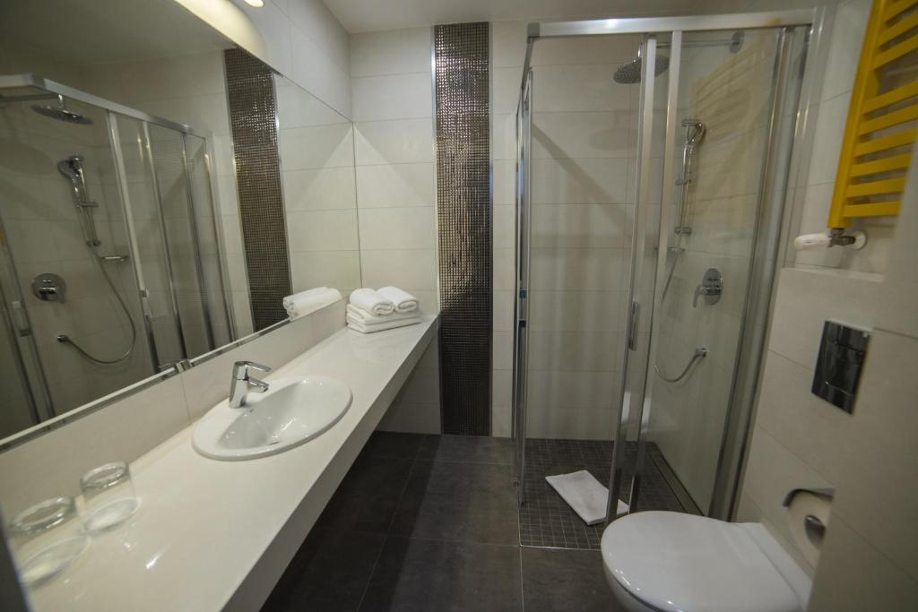 Koupelna v ubytování Hotel Arte