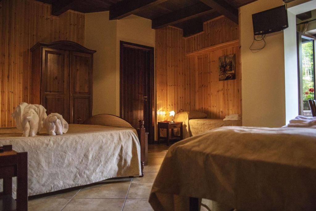 Postel nebo postele na pokoji v ubytování Hotel Palaghiaccio