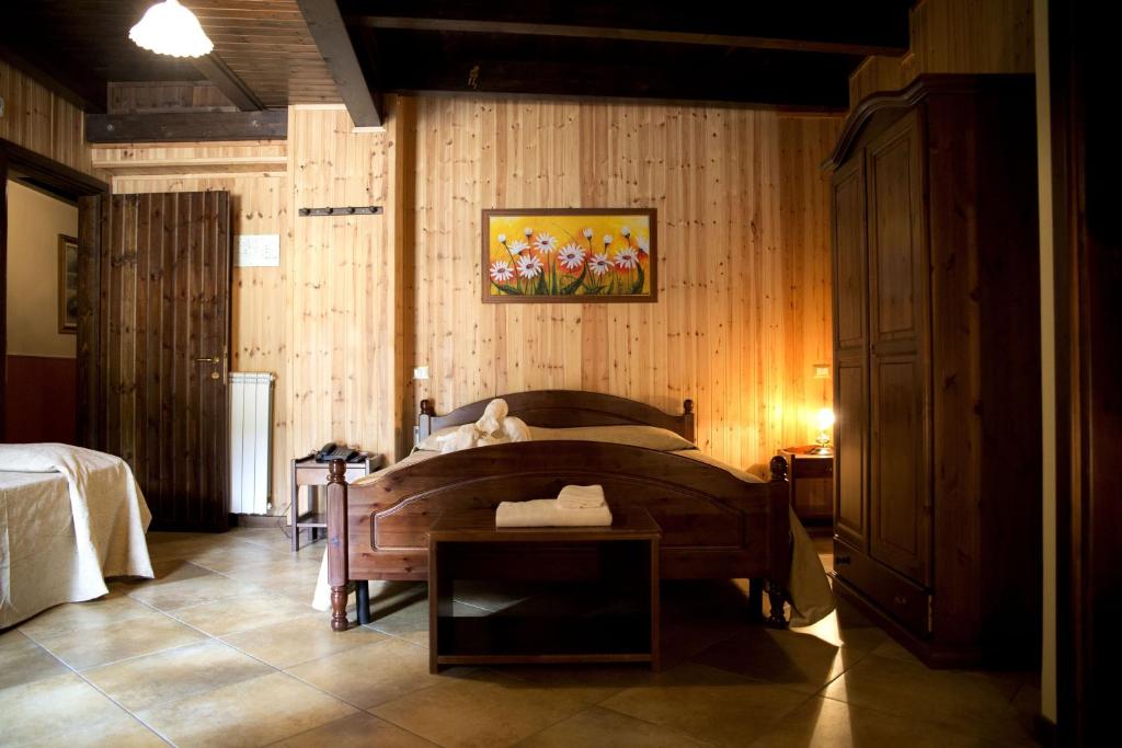 Postel nebo postele na pokoji v ubytování Hotel Palaghiaccio