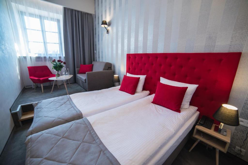 Postel nebo postele na pokoji v ubytování Hotel Arte