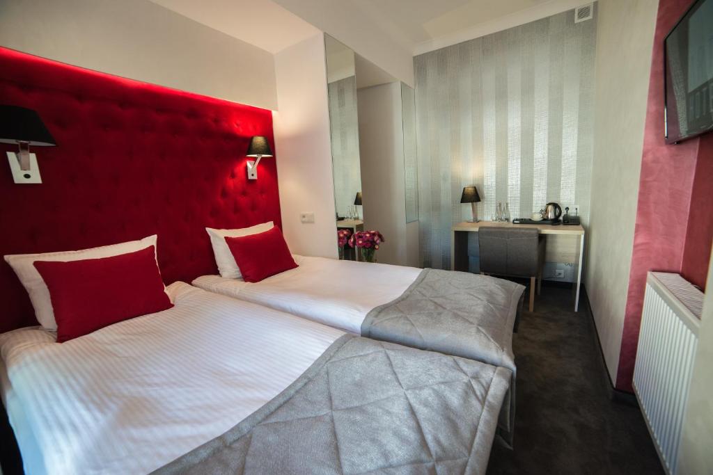 Postel nebo postele na pokoji v ubytování Hotel Arte