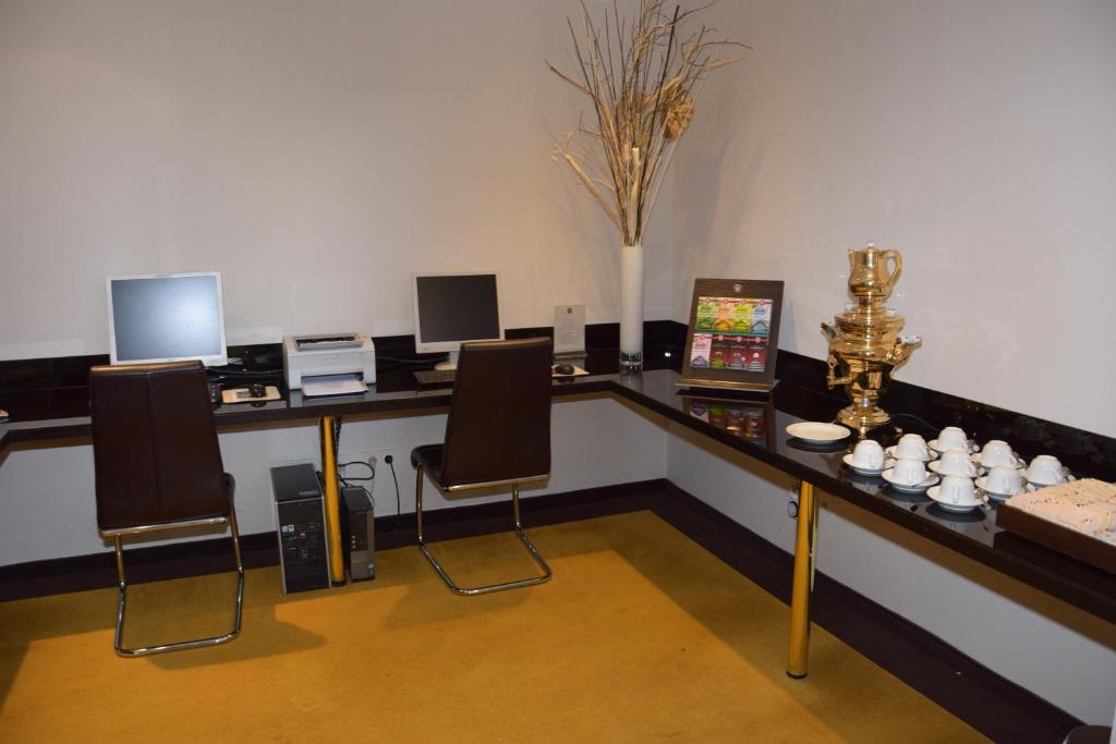 Telewizja i/lub zestaw kina domowego w obiekcie MyPlace Premium Apartments
