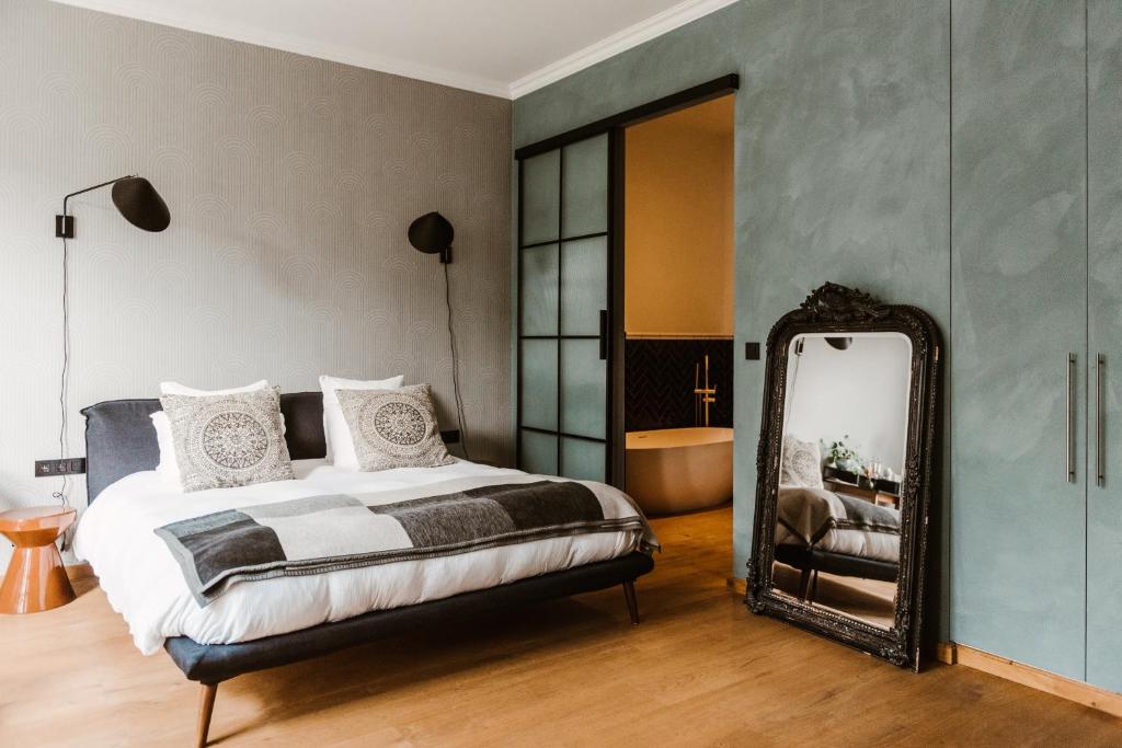 Postel nebo postele na pokoji v ubytování Boutique Hotel Marie Marie