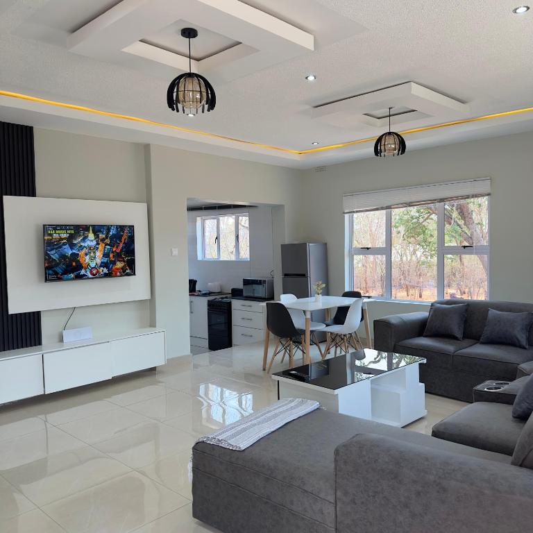 TV i/ili multimedijalni sistem u objektu BONGA Villas