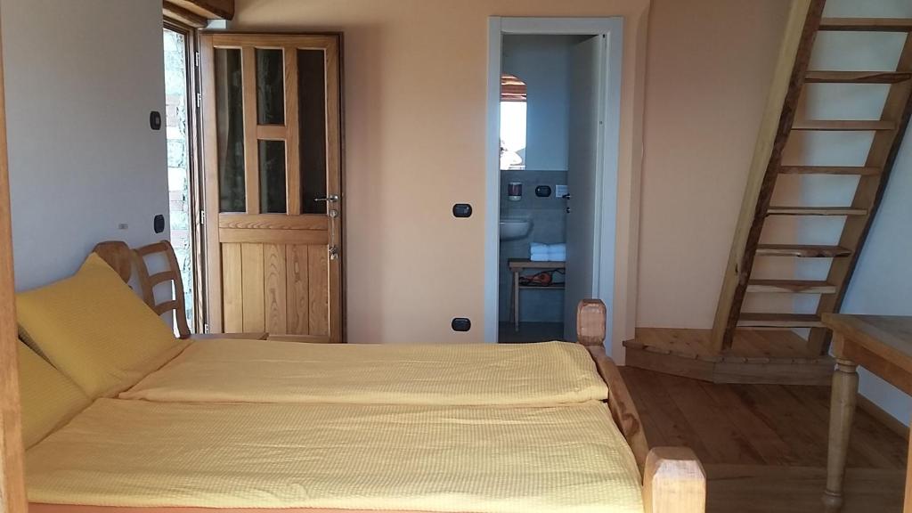 Postel nebo postele na pokoji v ubytování Agriturismo Zertin