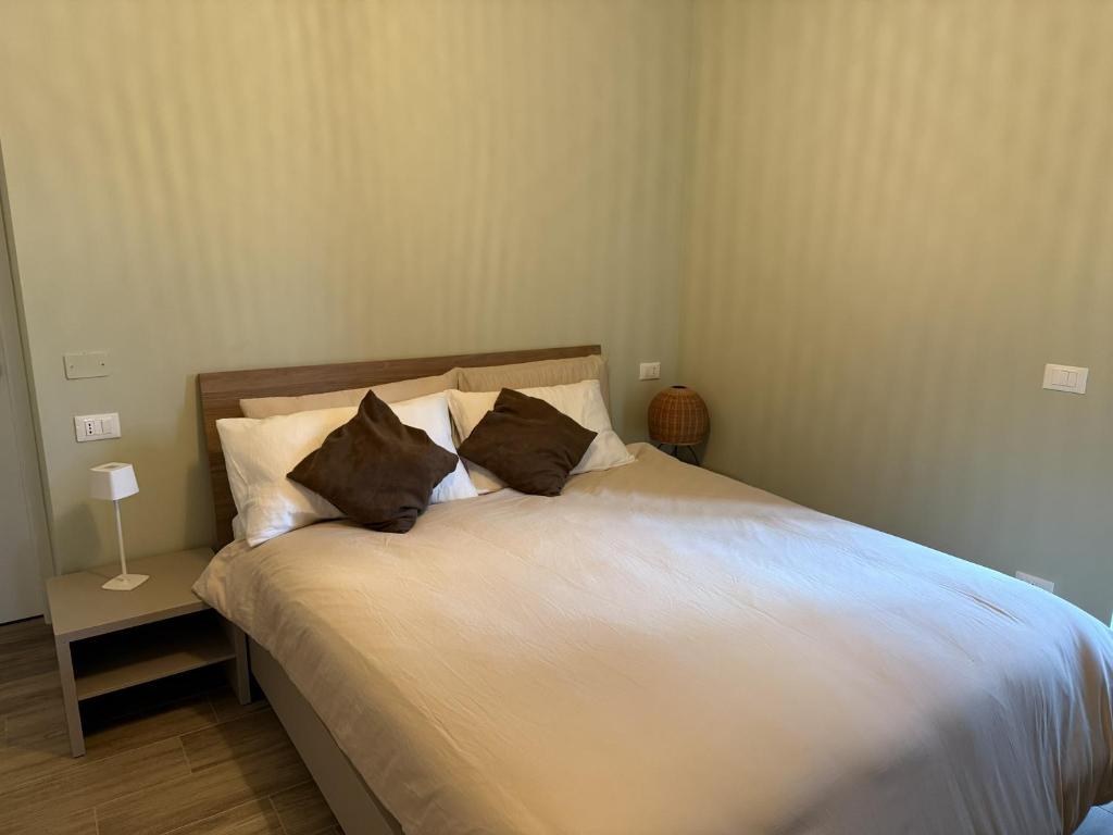 Ένα ή περισσότερα κρεβάτια σε δωμάτιο στο NessunConfine