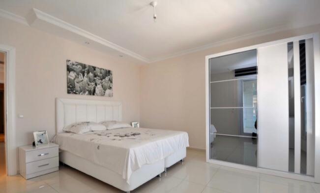 Ένα ή περισσότερα κρεβάτια σε δωμάτιο στο Bluebay Alanya