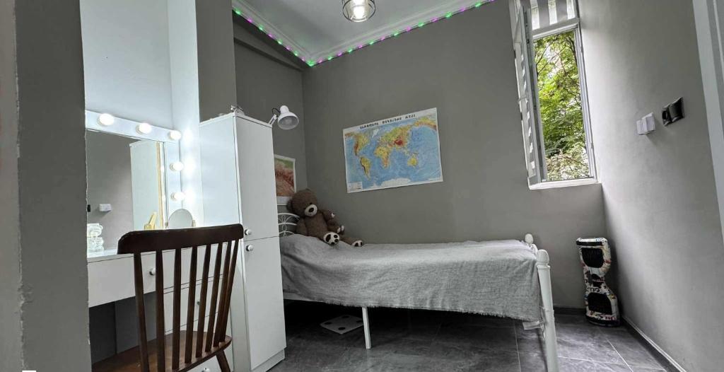 Ένα ή περισσότερα κρεβάτια σε δωμάτιο στο lambada house