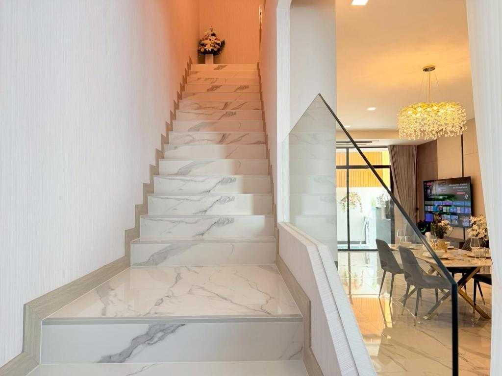 En eller flere senge i et værelse på Chilla B villa