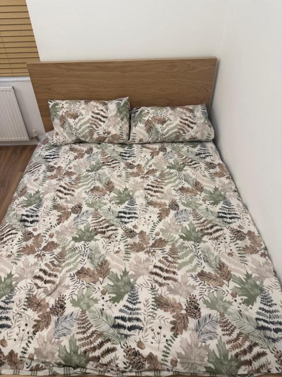 Ένα ή περισσότερα κρεβάτια σε δωμάτιο στο Comfort Studio In Wembley