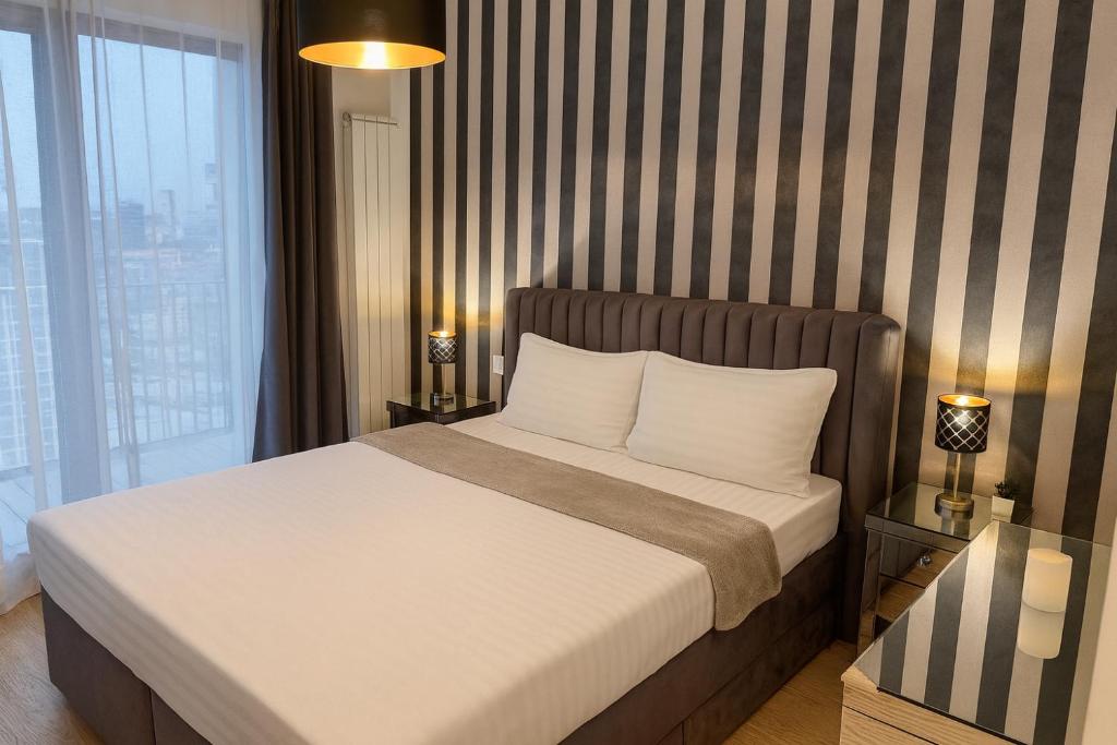 Postel nebo postele na pokoji v ubytování Belgrade Waterfront Penthouse 17th last floor