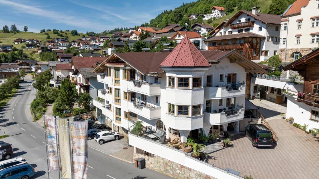 an aerial view of a town with buildings at LAUDEGGHOF Ladis - Apartments with Castle Views in Ladis