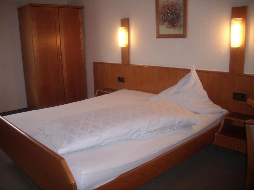 Postel nebo postele na pokoji v ubytování Landhotel Pingel