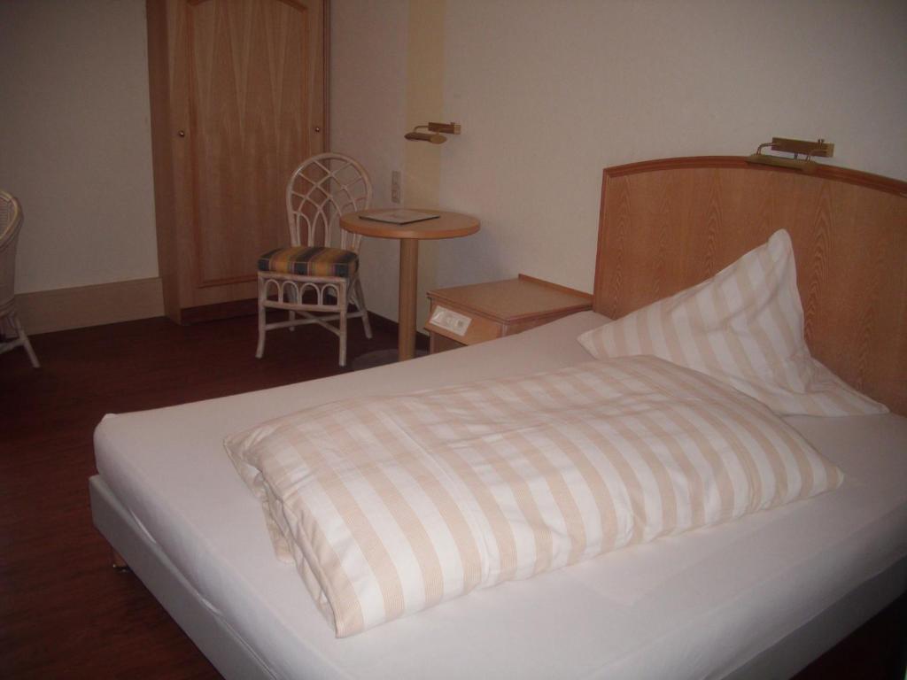 Postel nebo postele na pokoji v ubytování Landhotel Pingel