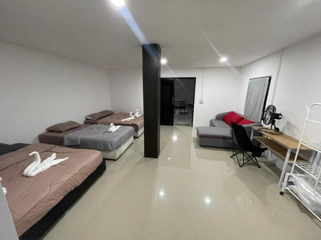 Ένα ή περισσότερα κρεβάτια σε δωμάτιο στο Banchasramanora resort