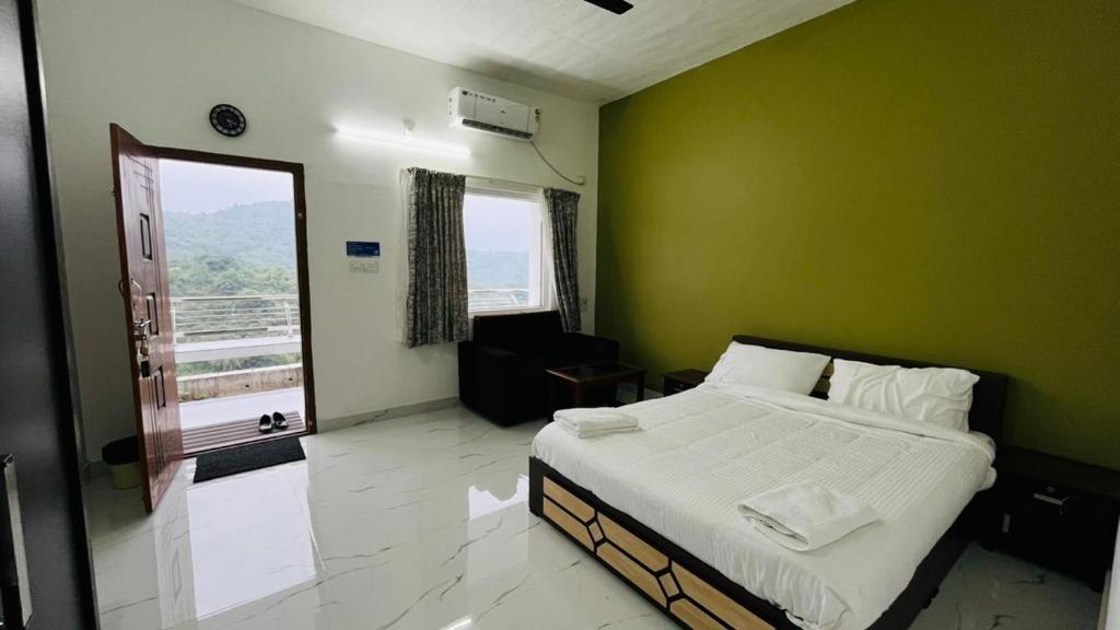 Ένα ή περισσότερα κρεβάτια σε δωμάτιο στο Mountain Breeze Resort