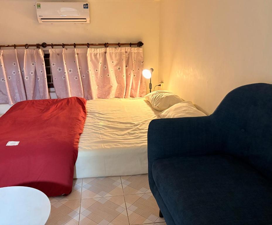 Giường trong phòng chung tại Tropical land little Hanoi homestay