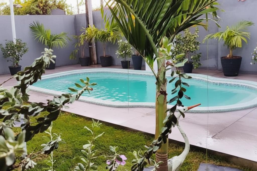 Bazén v ubytování Garden JP nebo v jeho okolí