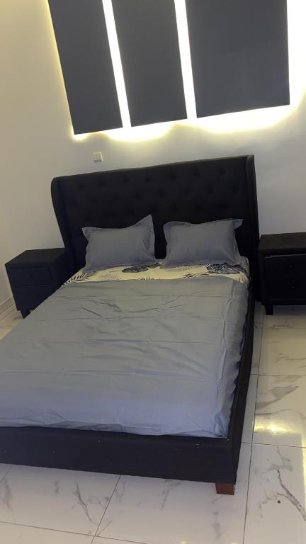 Ένα ή περισσότερα κρεβάτια σε δωμάτιο στο Malti business