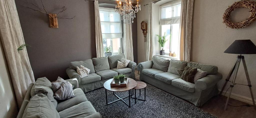 Χώρος καθιστικού στο XXL Cosy apartments Villa Goisern, centre with mountain view