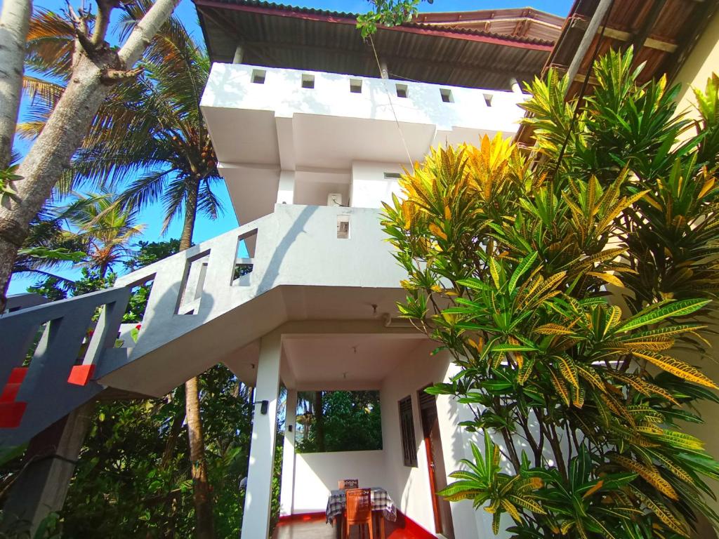 Un jardín fuera de Allan Guest Mirissa