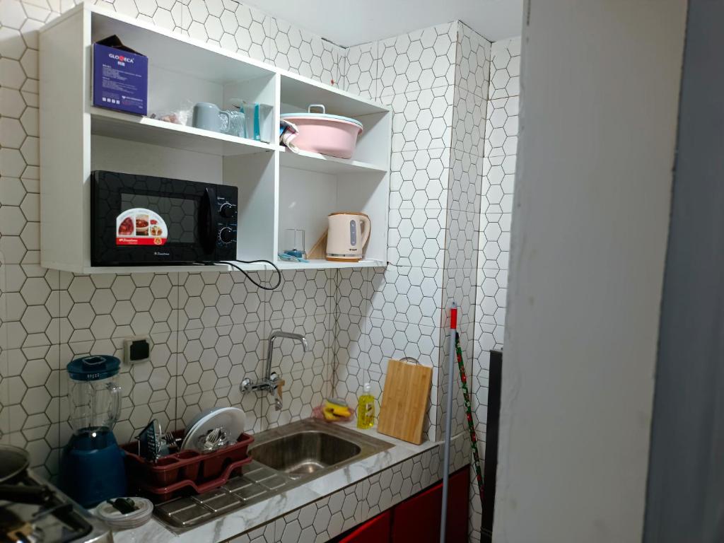 Køkken eller tekøkken på Vinofa Résidence