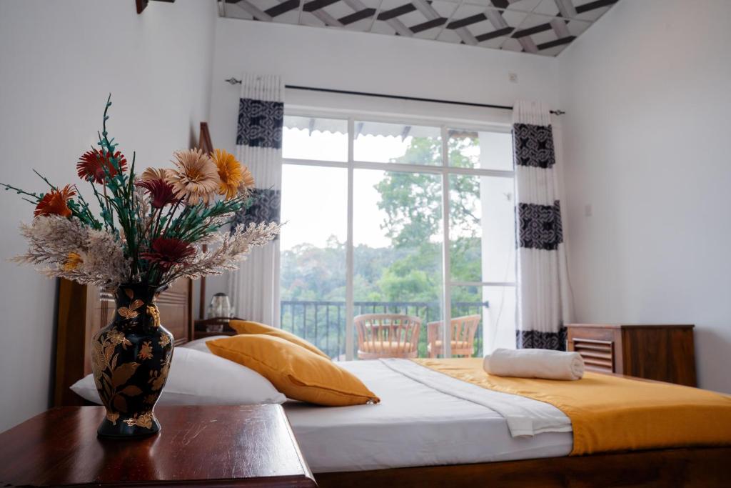 Ένα ή περισσότερα κρεβάτια σε δωμάτιο στο Medhani