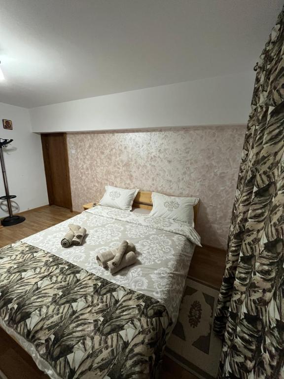 Ένα ή περισσότερα κρεβάτια σε δωμάτιο στο Apartament Comfort