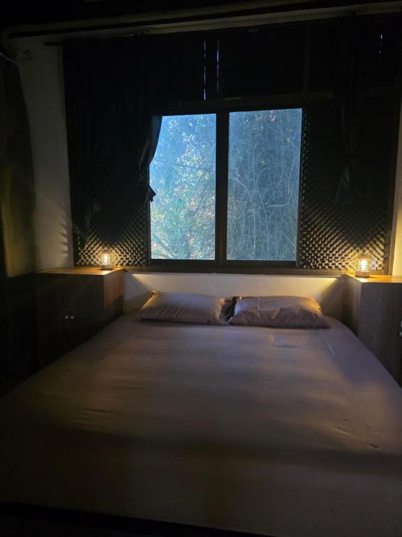 Postel nebo postele na pokoji v ubytování KNM Living Home