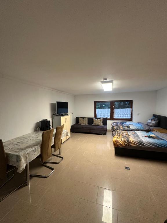 Ένα ή περισσότερα κρεβάτια σε δωμάτιο στο Zentrale Wohnung nähe Breisach am Rhein