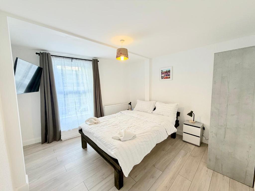 Postel nebo postele na pokoji v ubytování Alisha Town House