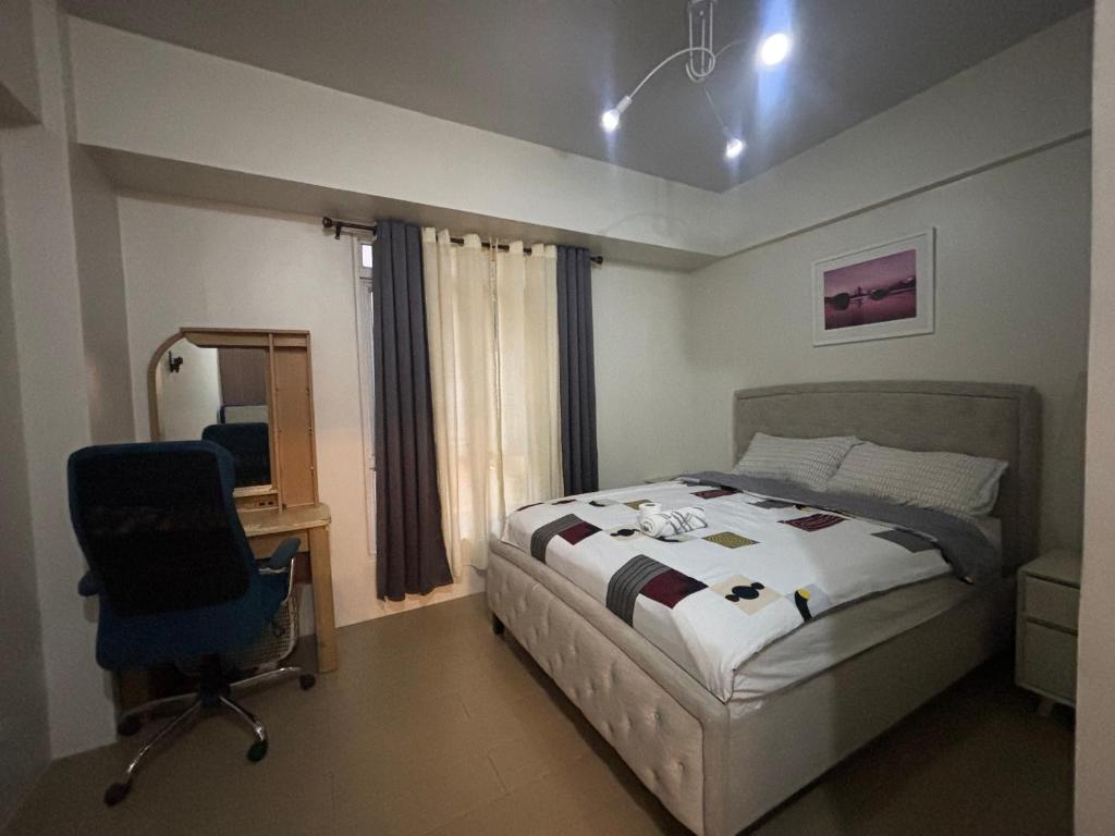 Кровать или кровати в номере Stay-cation 150Newport Boulevard Southwing