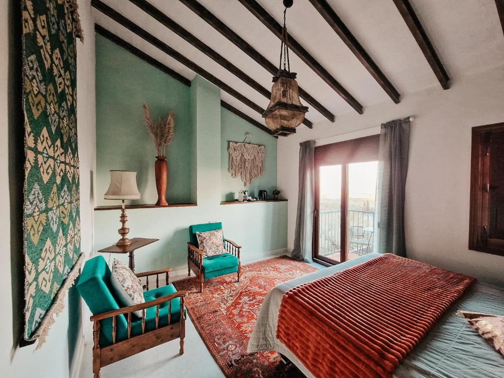 Ένα ή περισσότερα κρεβάτια σε δωμάτιο στο Finca Flamenco Holiday Suites Adults Only