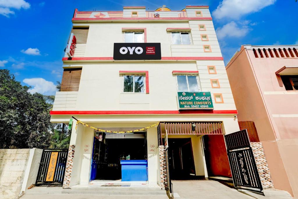 a building with a sign that reads oxo on it at Super Hotel O Nature Comforts in Bengaluru