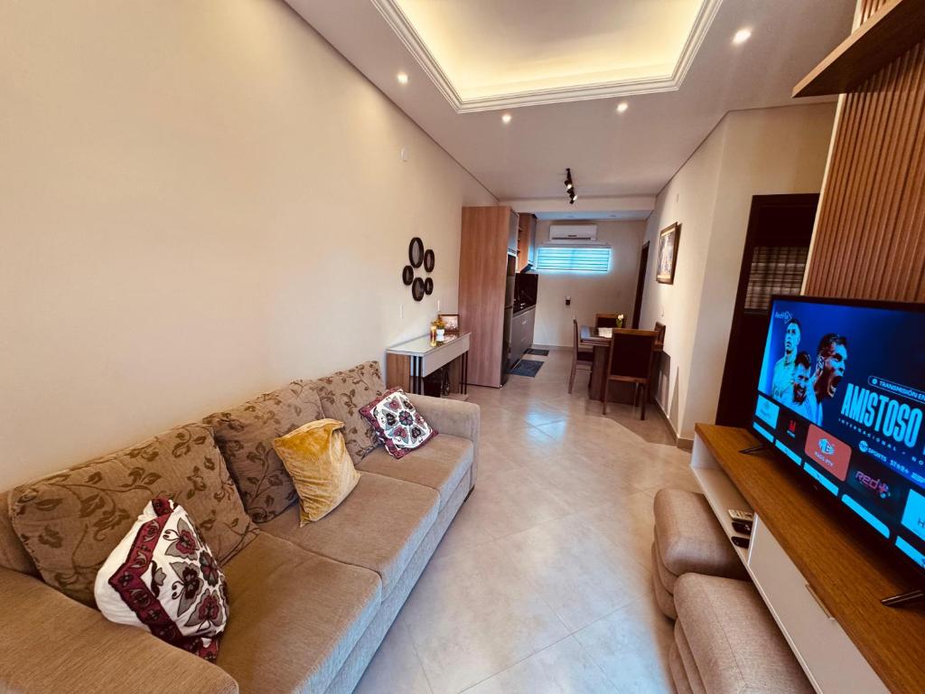 TV a/nebo společenská místnost v ubytování Coqueto y cómodo Duplex