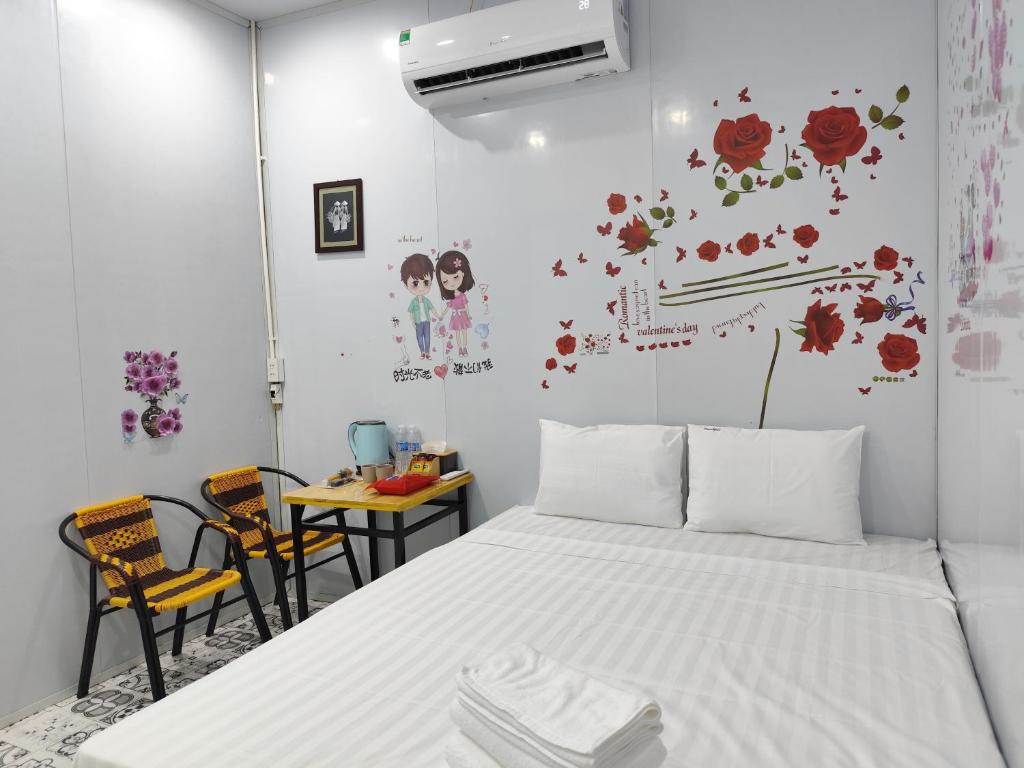 En eller flere senge i et værelse på Heartfelt Hideaway 2