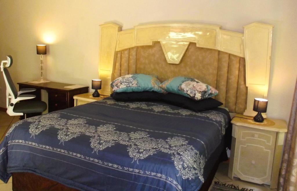 Ένα ή περισσότερα κρεβάτια σε δωμάτιο στο Garden Wing