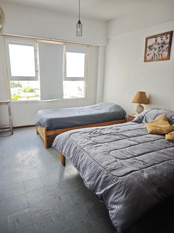 Postel nebo postele na pokoji v ubytování Monoambiente en Necochea frente a la playa hasta 4 personas