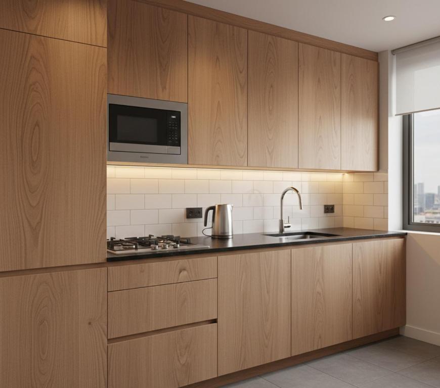 Кухня или мини-кухня в Amire Suits
