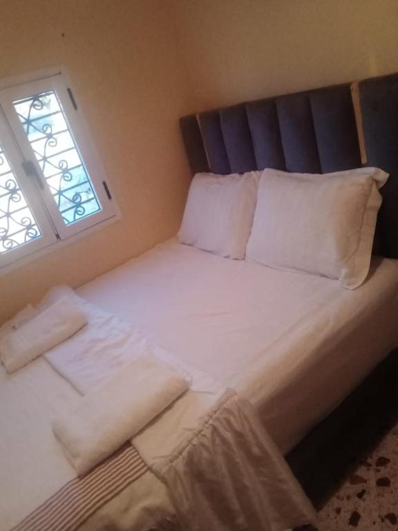 Ένα ή περισσότερα κρεβάτια σε δωμάτιο στο Taghazout beachside apartment