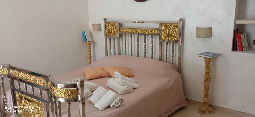 Una cama o camas en una habitación de Mikiami Semplicemente Accogliente