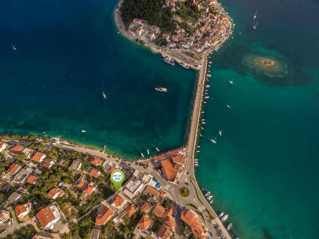 an overhead view of a city and the water at Flores Luxury Suites-Rogoznica in Rogoznica