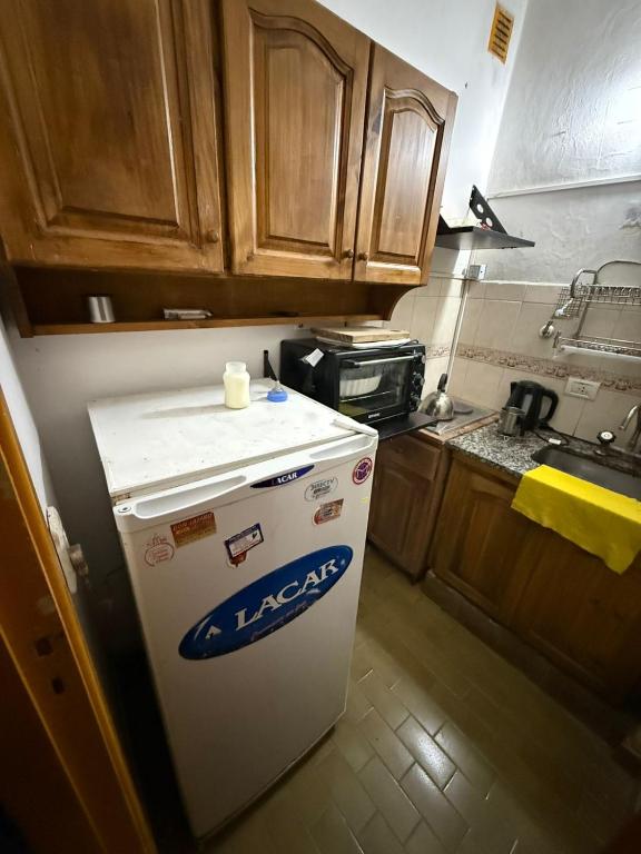 Η κουζίνα ή μικρή κουζίνα στο Departamento en San Bernardo