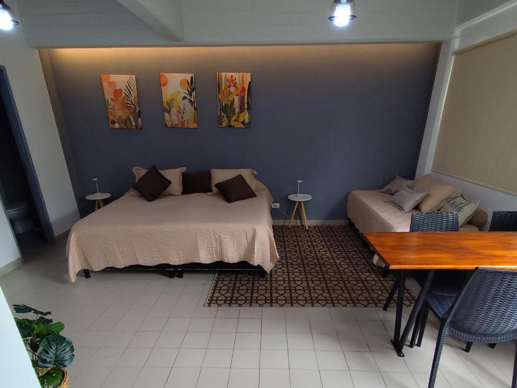 Ένα ή περισσότερα κρεβάτια σε δωμάτιο στο Monoambiente Eldorado 1