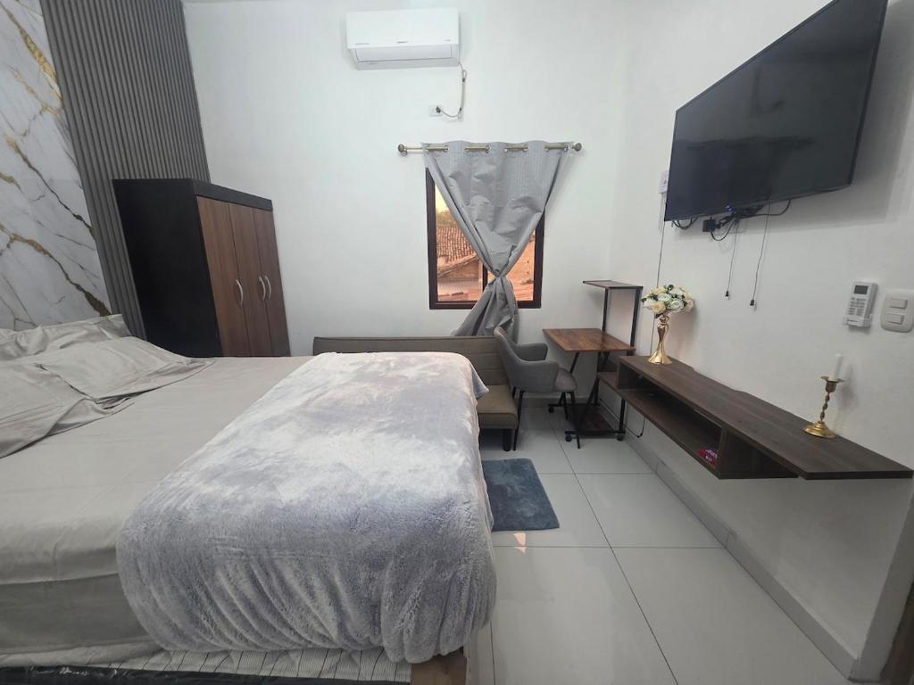 Giường trong phòng chung tại Beautiful apartment in Ocotepeque